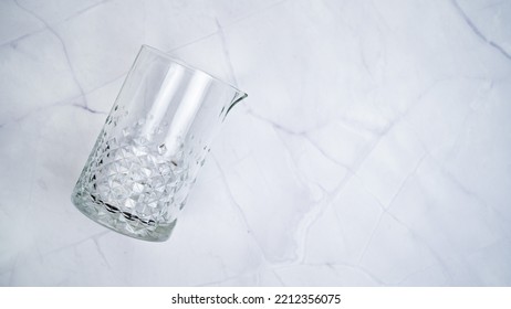 Mixing glass on white marble background - Powered by Shutterstock