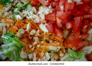 Mixing Ingredients For Making Greek Salad. Cooking Greek Salad