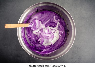 Mixing Meringue Into Ube Cake Batter: Using A Spatula To Mix Up Cake Batter Made With Purple Sweet Potatoes