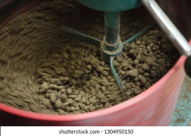 Mixing Sludge in Laboratory with pan mixer
