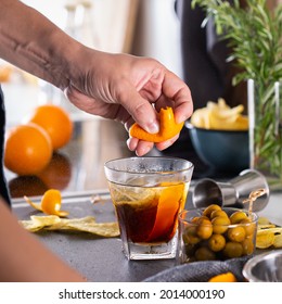 Mixologist Making Refreshing Cocktail With Vermouth At Home