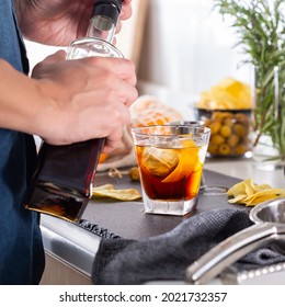 Mixologist Making Refreshing Cocktail With Vermouth At Home