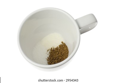 Mixture Of Coffee Powder, Sugar And Creamer In A Cup