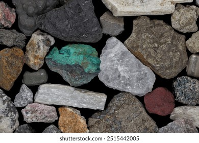 Mixture of mine, mining ores, commodities, metals, coal. Background concept, texture, rocks. Variety, mixed, many, multi-colored, colorful. Bear, bull market.