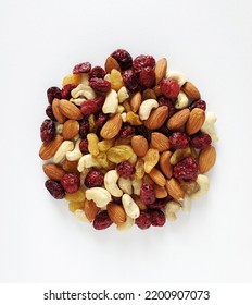 Mixture Of Nuts And Dried Berries Isolated On White Background. Copy Space, Top View, Close-up.
