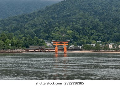 Miyajima Torii is a tori built into the water as a gate to the island and belongs to Itsukushima Shrine. The Itsukushima torii kanji are 厳島神社, which means Itsukushima Shrine.