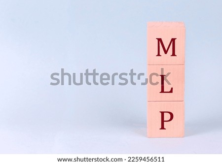 MLP on wooden cubes on blue background
