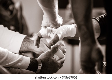 MMA Boxing Team Hands Wrapping Fighter Hand before Event Fight