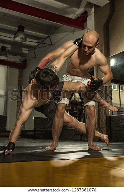 Mma Fighter Falling On Mat Keeping Stock Photo Edit Now 1287381076