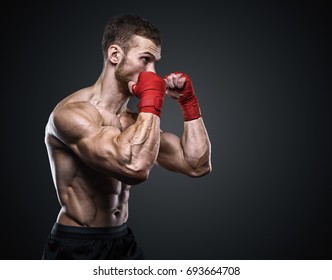 MMA Fighter Preparing Bandages For Training.