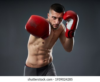 MMA Fighter Training, Studio Shot Isolated On Gray Background