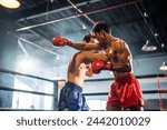 MMA or Thai Boxing match, Two professional fighters punching or boxing, Fit muscular caucasian athletes or boxers fighting, Sport competition and human emotions, Gym atmosphere background
