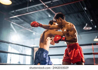 MMA or Thai Boxing match, Two professional fighters punching or boxing, Fit muscular caucasian athletes or boxers fighting, Sport competition and human emotions, Gym atmosphere background
 - Powered by Shutterstock