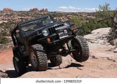 Moab Utah , USA , April , 23, 2019: Black Rubicon Jeep On The Metal Masher Off Road Jeep Trail .