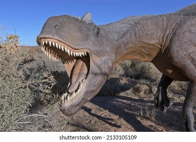 Moab, Utah, USA - November 22, 2021: Allosaurus Fragilis Dinosaur Replica With Open Jaws Standing On The Moab Giants Dinosaur Trail