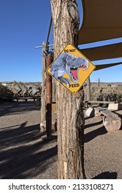 Moab, Utah, USA - November 22, 2021: Funny Sign Don't Feed Dinosaurs On The Moab Giants Dinosaur Trail