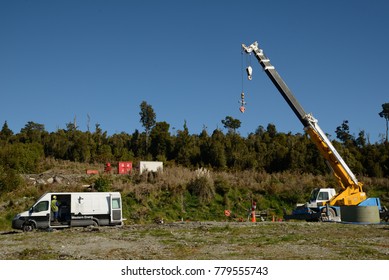 MOANA, NEW ZEALAND, OCTOBER 27, 2017: An Oil Well Engineer Works From The Back Of Specialised Van To Log The Condition Of Steel Casing Inside An Abandoned Oil Well. 