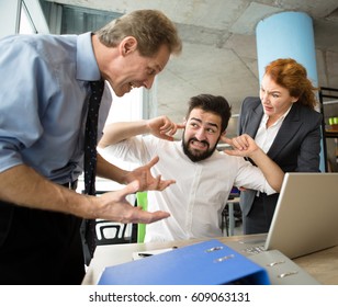 Mobbing, stress, work, scandal concepts. Angry bosses man and woman screaming, shouting and yelling at their worker. Handsome man having stress and closing with ears.