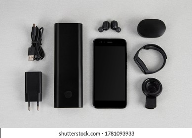 Mobile accessories include black power bank wireless headphone charger type C cable smartwatch macro lens