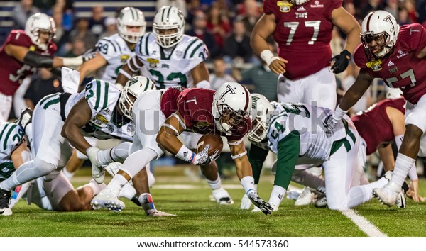 Mobile, Alabama -\
12/23/2016:  Troy University #26 B.J. Smith recovers his own fumble\
after a kick-off from the Ohio Bobcats during the Dollar General\
Bowl at Ladd-Peebles\
Stadium.