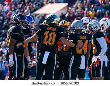 Mobile, Alabama / USA - January 25 2020: South Team Quarterback Justin Herbert Gathers Players To Huddle During Reese's Senior Bowl Football Game.