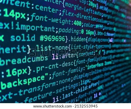 Mobile app building. Javascript functions, variables, objects. Developer working on program codes in office. Binary code digital technology background. PC software creation business