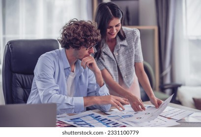 Mobile app developers collaborates to brainstorm, select ideas, optimizing procedure. Picking the best options, ensuring scalable, user-friendly interfaces. Prototyping functionality, color choices.