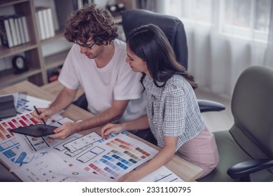 Mobile app developers collaborates to brainstorm, select ideas, optimizing procedure. Picking the best options, ensuring scalable, user-friendly interfaces. Prototyping functionality, color choices.