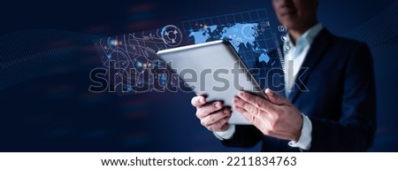 Mobile apps, GPS mapping to pinpoint the location of address. Concept of a man's hand using a digital tablet to search for target location on cityscape, smart logistics, worldwide business technology.