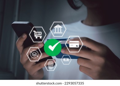 Mobile banking network, online payment, digital marketing. Using mobile phone with paying via mobile banking app with icon network connection on virtual screen. Financial Technology. - Powered by Shutterstock