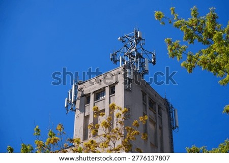 Mobile base station rooftop infrastructure in Europe. Mobile phone transmitters in Lodz, Poland.