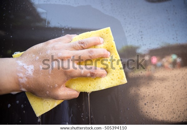 Mobile car wash\
sponge to scrub the\
surface.