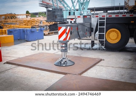 Mobile Crane with Fully Deployed Outriggers: Emphasizing Outrigger and Plate Load Management