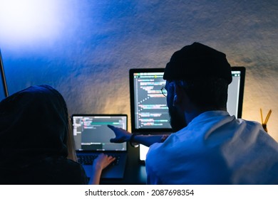 Mobile Developers Team Writes Program Code On A Computer, Programmers Work In Home Office.