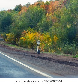 Mobile device speed control detector on the side of the road. A trap for drivers or a Camera on the road.