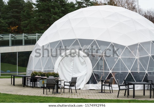 Mobile\
dome design. A geodesic dome. A hemispherical thin-shell structure\
(lattice-shell) based on a geodesic\
polyhedron.