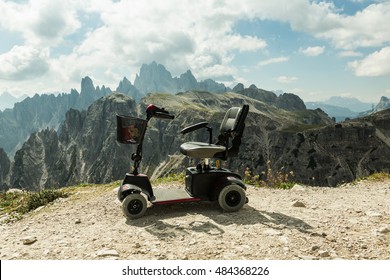  Mobile electric buggies on the mountain, Dolomites, Italy. disable car. Motorised wheelchair for disposable people.