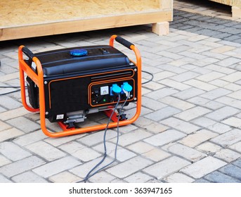 Mobile Gasoline Generator on the Building Site 