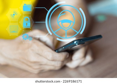 Mobile hacker and computer cyber security, online data breach or identity theft. hacked phone Hacker and mobile phone with hologram data mobile scams fraud