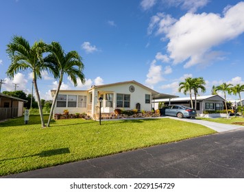 Mobile Homes With Palm Trees. Photo Of Low Income Housing Development In Florida USA