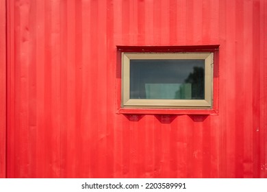 A Mobile Metal Container Office Cabin With Glass Window At Construction Working Site. Industrial Building Equipment Photo.