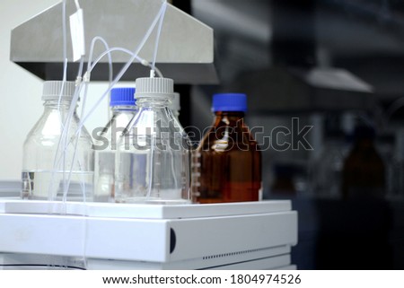 Mobile phase in bottles for High Performance Liquid Chromatography (HPLC) analysis.
The sample is dissolved in the solvent.