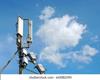 Mobile phone antenna, telecommunication tower with clouds on center blue sky, cell antenna, transmitter, cell phone tower,  telecom radio tower - Shutterstock ID 643082590