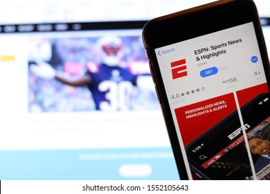 Mobile Phone With ESPN : Sports News Logo On Screen Close Up With Website On Laptop. Blurred Background With ESPN. Los Angeles, California, USA - 27 October 2019, Illustrative Editorial