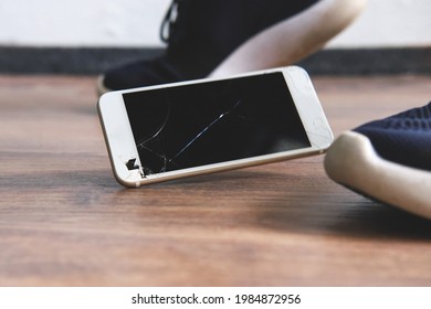 The mobile phone falls to the floor - Powered by Shutterstock