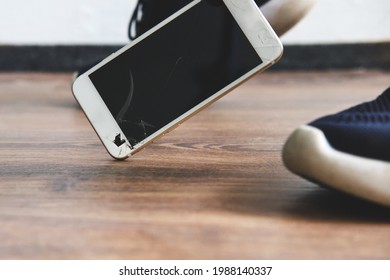 The mobile phone falls to the floor - Powered by Shutterstock