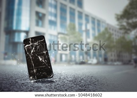 Mobile phone falls on the street