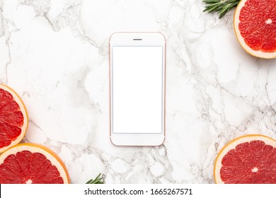 Mobile Phone And Grapefruits With Rosemary On Marble Background, Fruit Flatlay, Summer Minimal Compositon