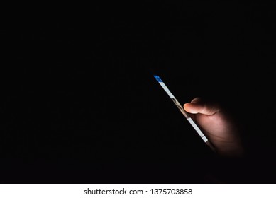 Mobile Phone In Hand On Black Background 