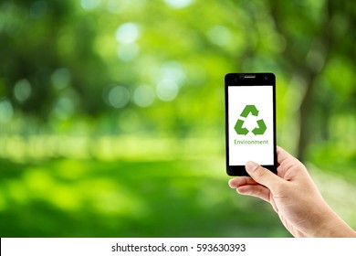 Mobile Phone Holding Hand With Recycle Symbol Eco Environment Icon Concept